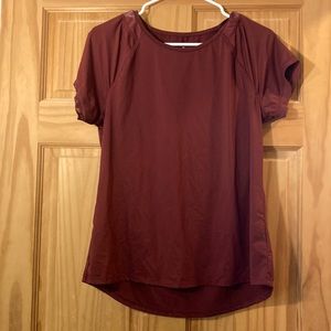 Medium dark Red silky workout top.